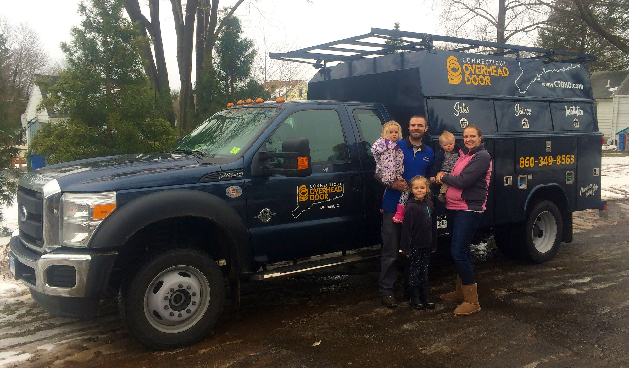 Connecticut Overhead Door service truck and the Martin family